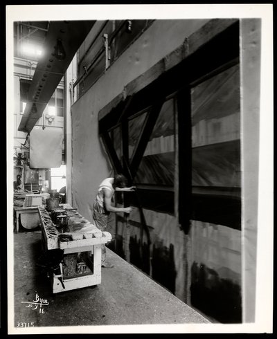 A Scenic Artist Painting a Flat in a Scene Shop, New York, 1915-6 by Byron Company